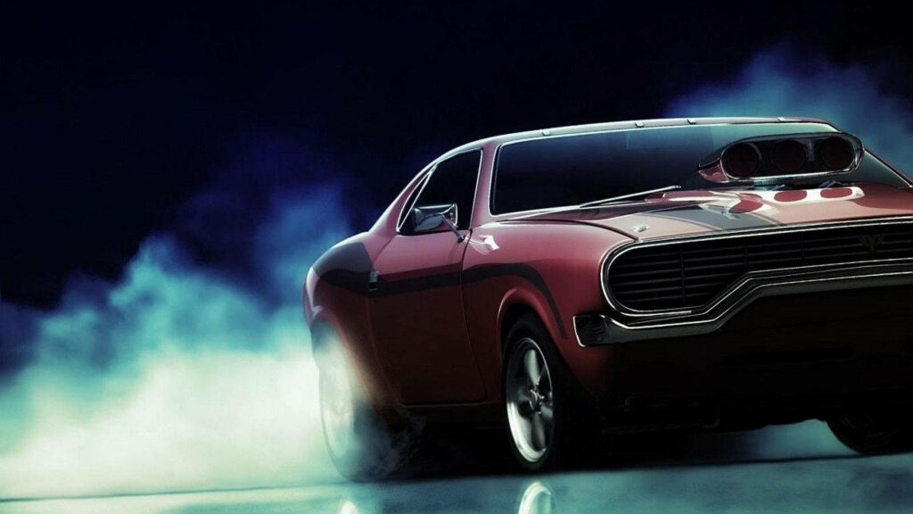 Red classic American muscle car speeding through smoke showcasing vintage automotive power wallpaper