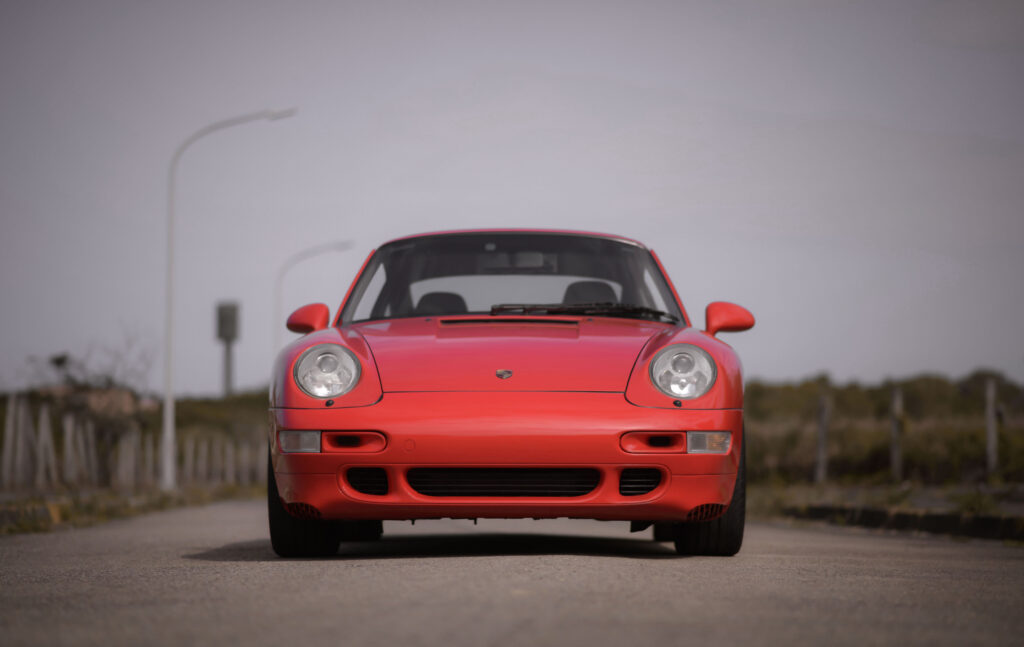 Stunning Red Porsche 993 Wallpaper: Iconic Vintage Sport Car Design