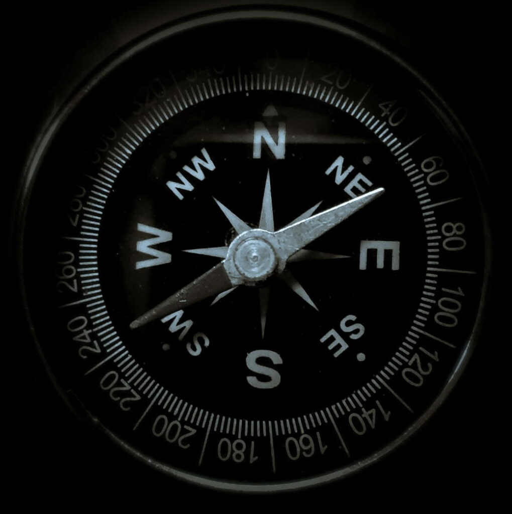 Close-Up Classic Compass Wallpaper with Bold Cardinal Directions