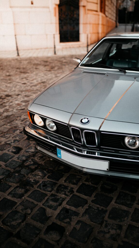 Stunning Silver BMW 635CSI Wallpaper on Cobblestone Street