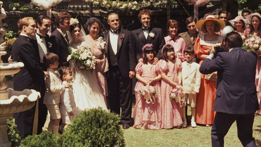 Classic Godfather Wedding Scene: Family & Friends Photo Wallpaper