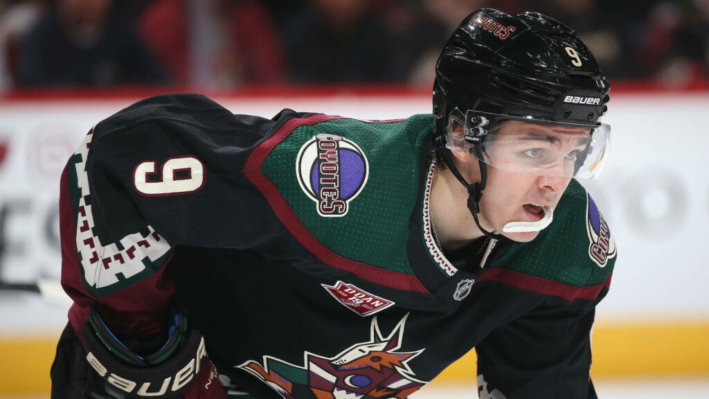 Clayton Keller Arizona Coyotes intense focus maroon green black jersey NHL hockey wallpaper