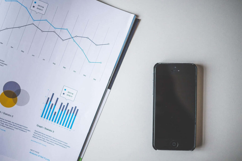 Professional Wallpaper: Smartphone & Business Analytics Report