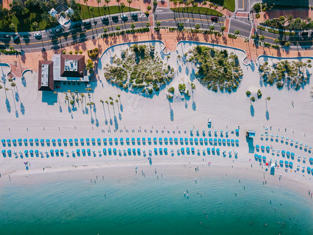 Aerial view of Clearwater Beach Florida with white sand turquoise water and sun loungers wallpaper