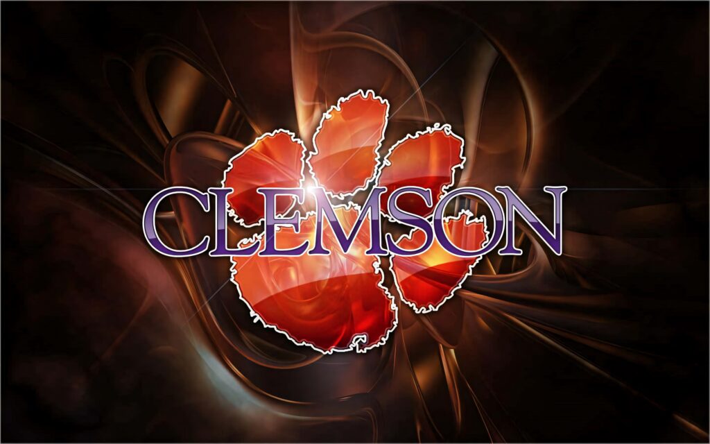 Clemson Tigers football logo orange tiger paw with dynamic dark fiery swirls wallpaper background