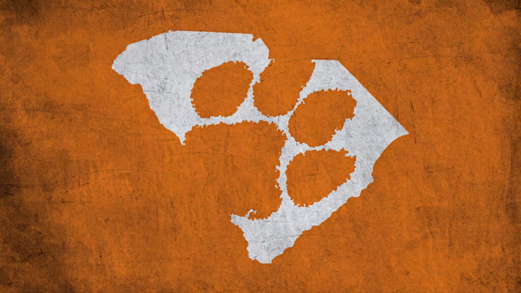 Clemson Tigers football paw logo in white on orange rustic textured background wallpaper