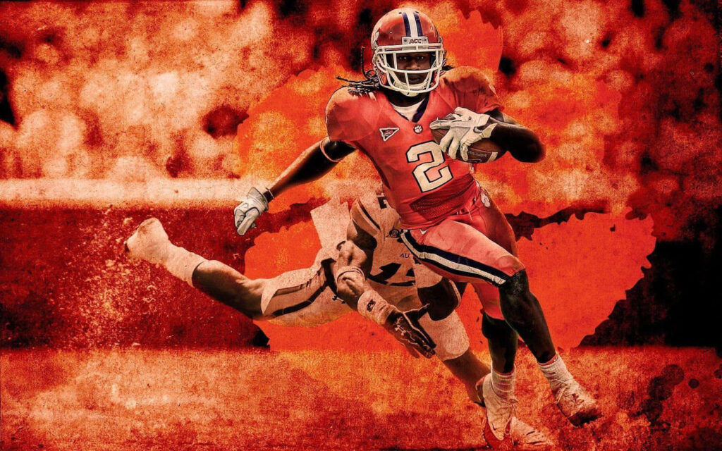 Clemson Tigers football player number 2 evading defender with vibrant orange background wallpaper