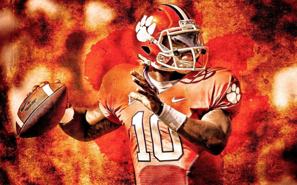 Clemson Tigers football player in orange uniform throwing ball fiery background wallpaper