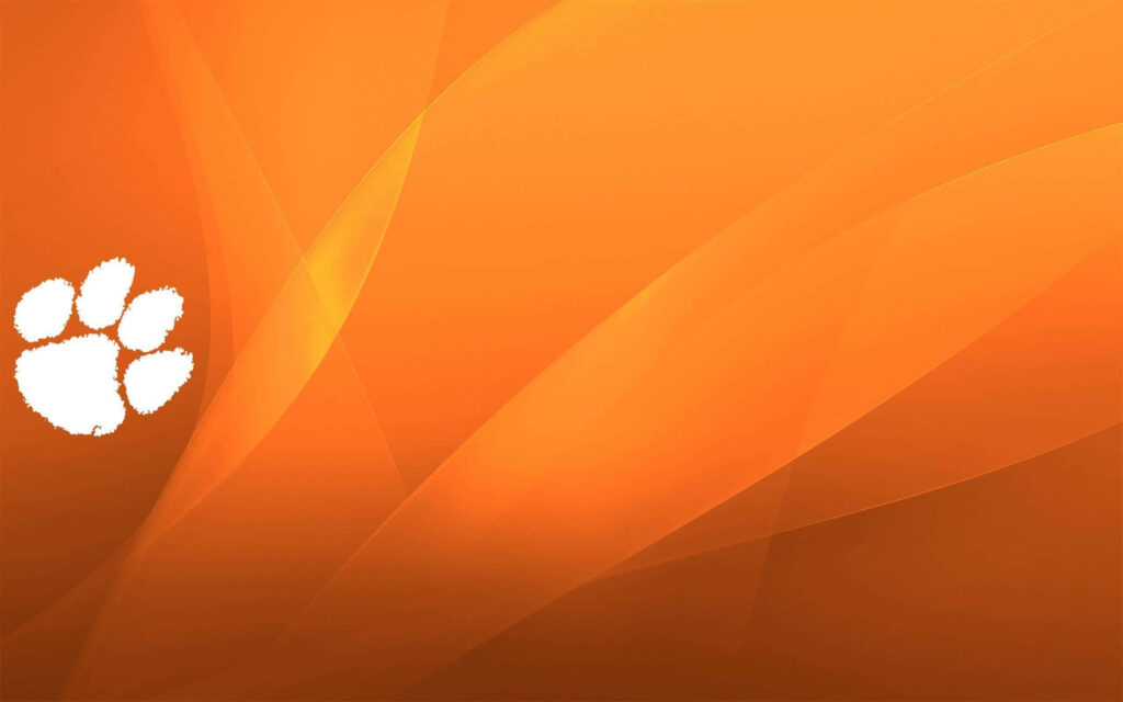 Clemson Tigers Football white paw logo on vibrant orange abstract wave background wallpaper