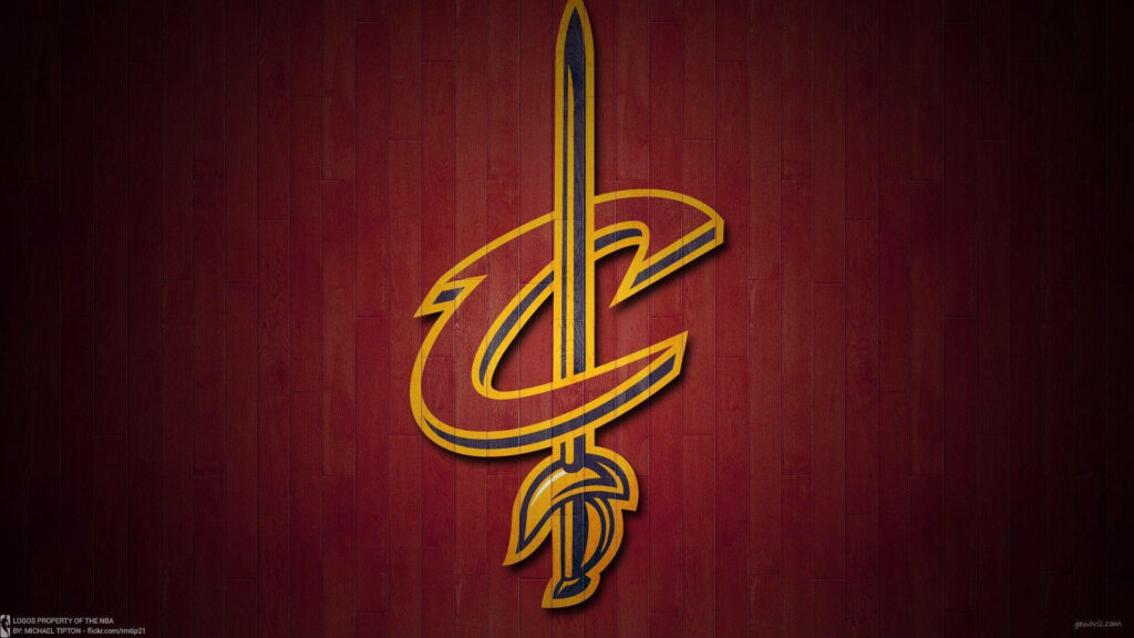 Cleveland Cavaliers gold sword logo on dark textured background bold team wallpaper
