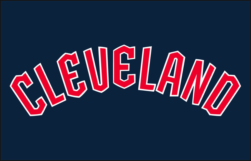 Cleveland Guardians bold red arched logo on deep navy background sports culture wallpaper