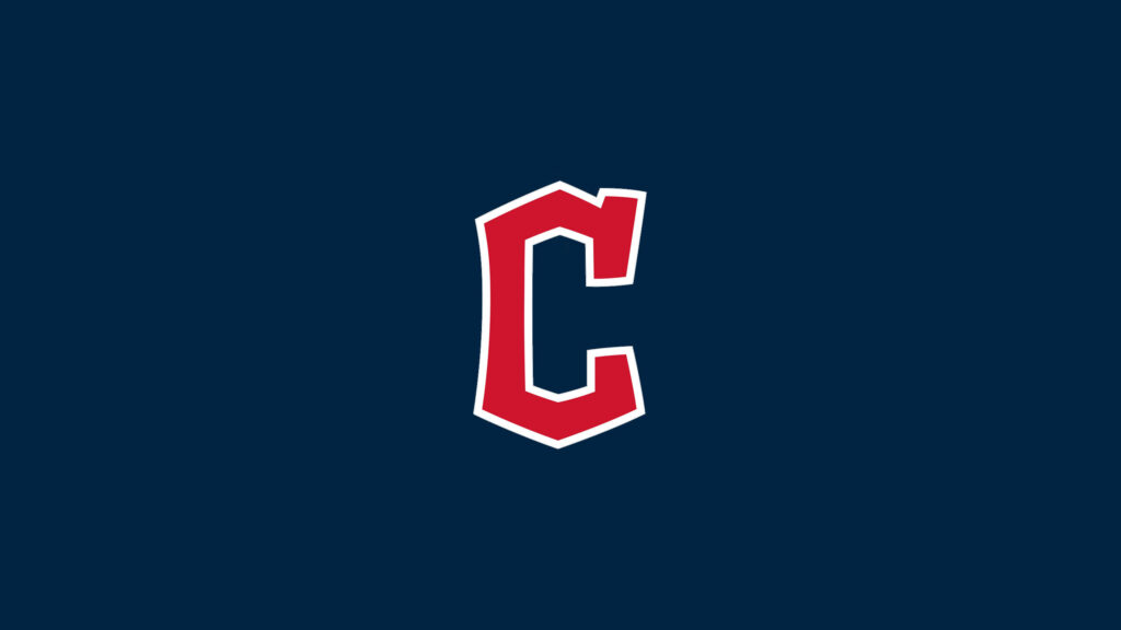 Cleveland Guardians bold red C logo outlined white on deep navy blue modern sports wallpaper