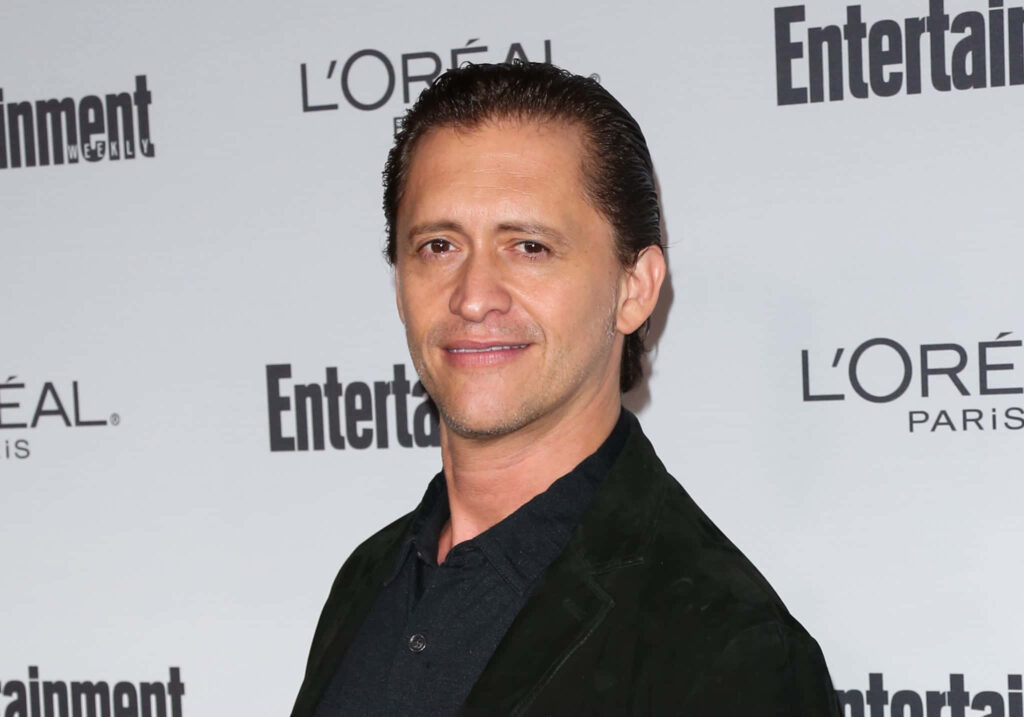 Clifton Collins Jr in dark jacket at Entertainment Weekly L'Oréal event with soft professional lighting Wallpaper
