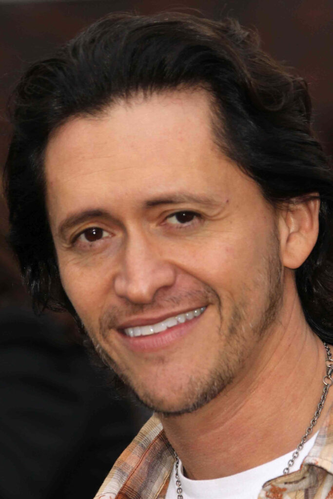 Clifton Collins Jr close-up portrait warm expression casual earth tones natural look wallpaper