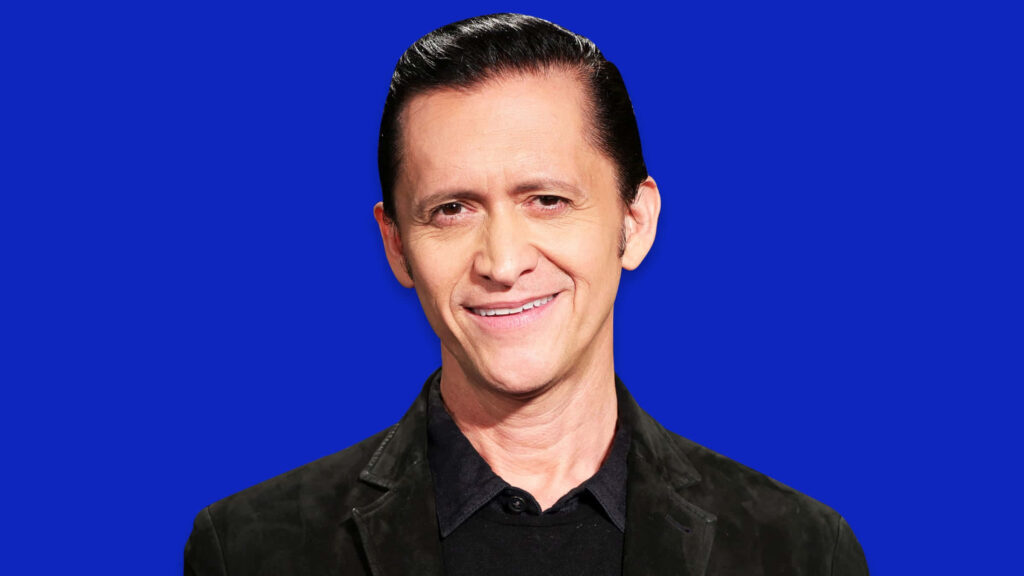 Clifton Collins Jr confident smile black jacket blue background sharp vivid portrait wallpaper