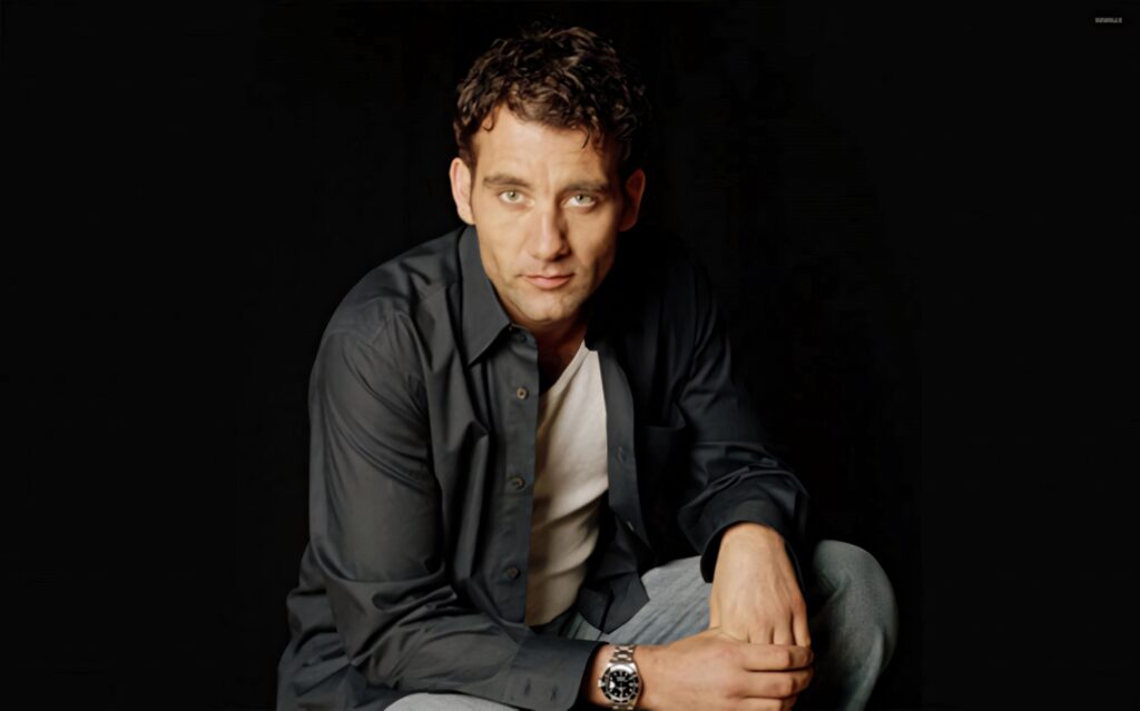 Clive Owen intense gaze portrait wearing dark shirt white tee minimalist modern wallpaper background