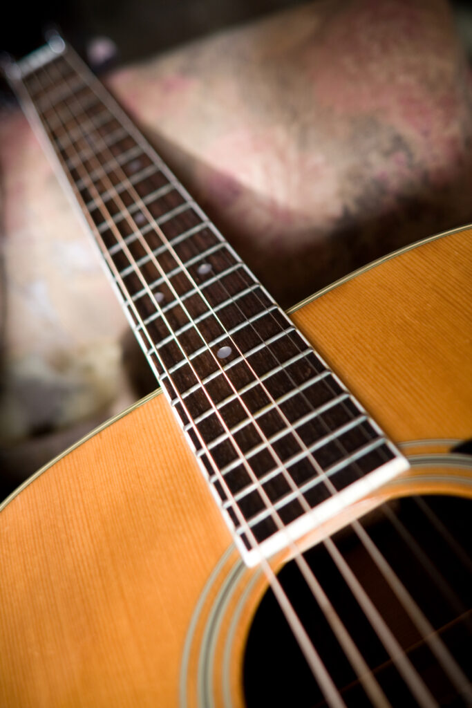 Close-Up Acoustic Guitar Wallpaper: Fretboard & Strings Harmony