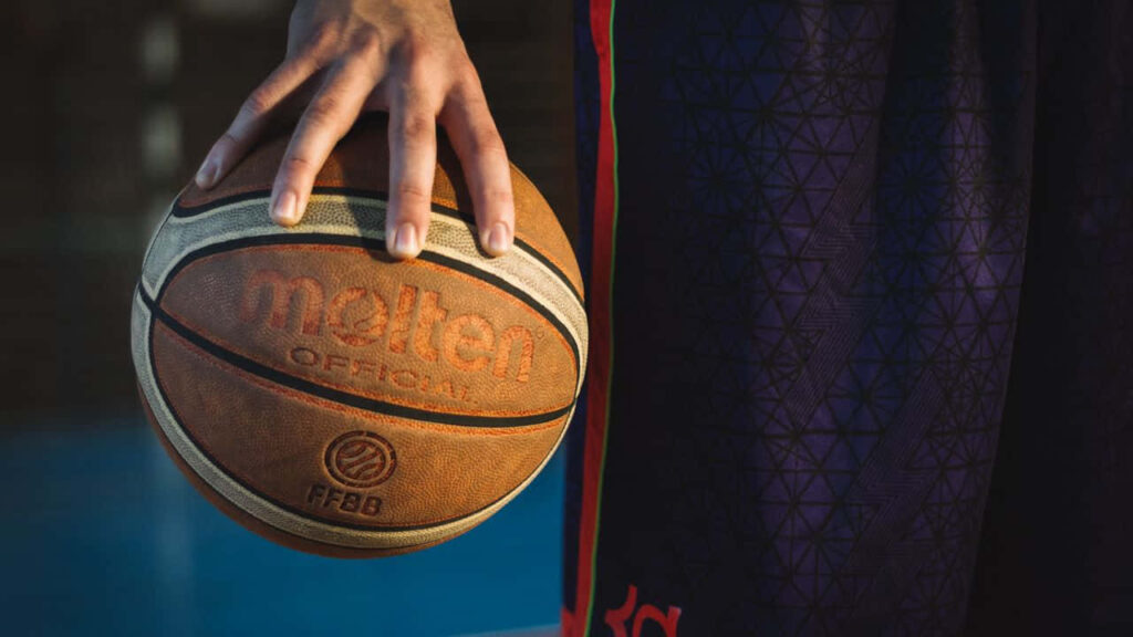 Close-Up Basketball Player Wallpaper: Texture & Sport Uniform Focus