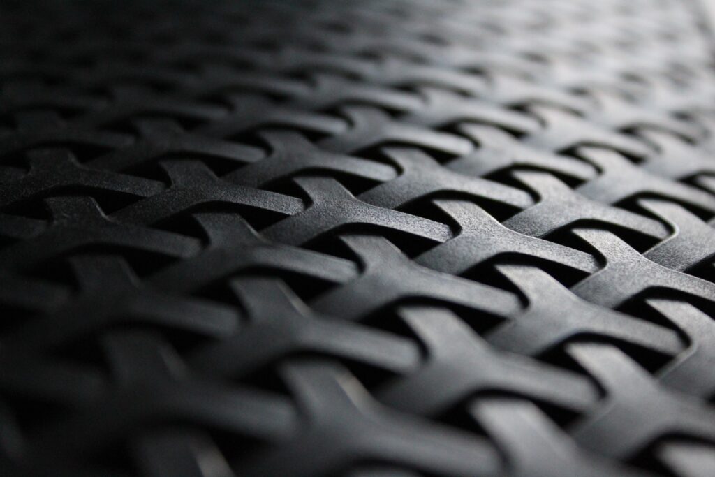 Intricate Black Woven Texture Wallpaper Background Close-Up