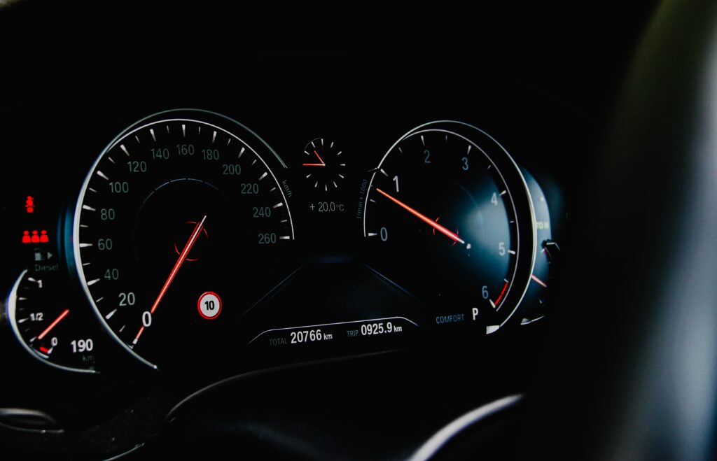 Modern Car Dashboard: Speedometer & Tachometer Close-Up Wallpaper