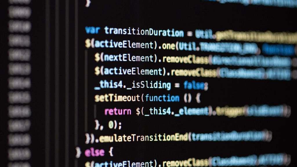 Close-Up Programming Code Wallpaper: Highlighted Syntax & IT Design