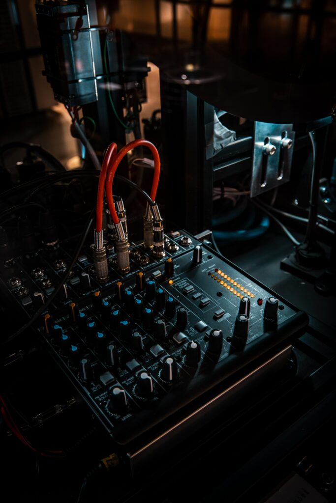 Close-Up DJ Setup Wallpaper: Sophisticated Mixing Console & Equipment