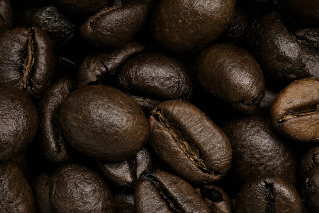 Rich Dark Coffee Beans Close-Up Wallpaper Background