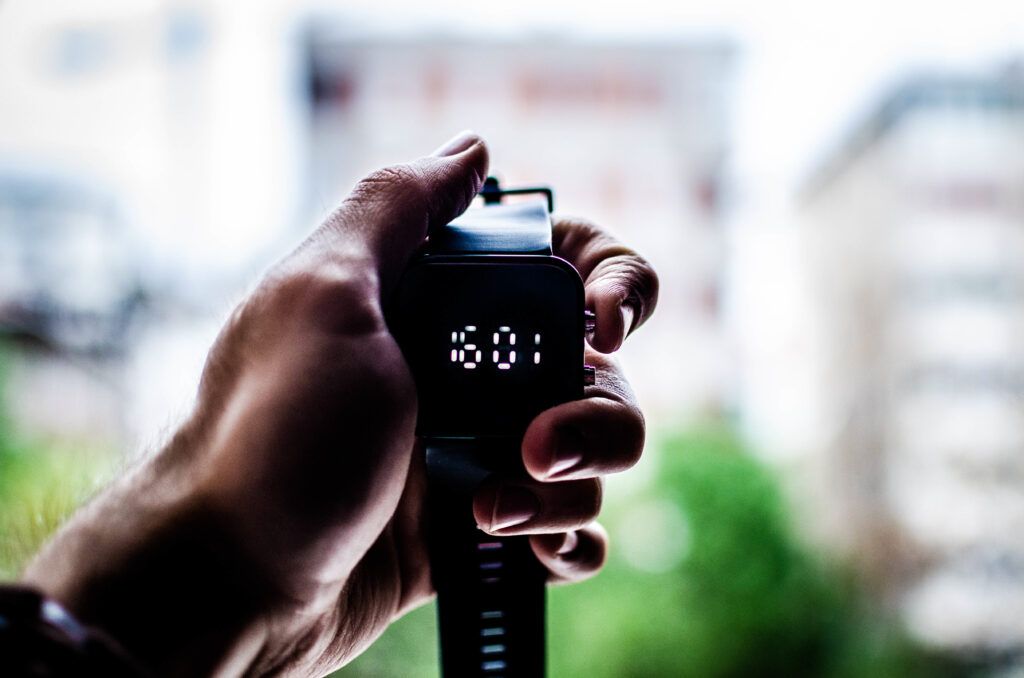 Close-Up Digital Wristwatch Wallpaper: Modern Minimalist Background