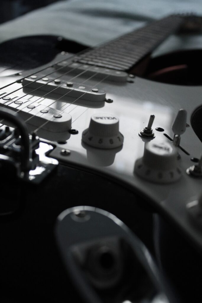 Elegant Electric Guitar Close-Up: Details & Craftsmanship Wallpaper
