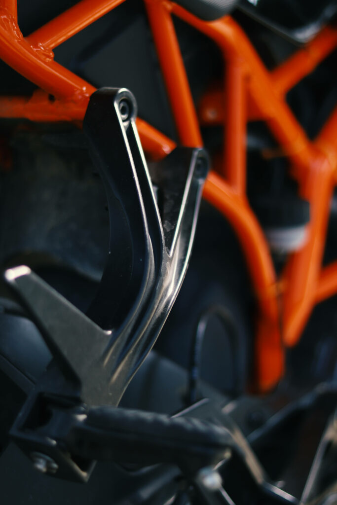 KTM Bike Close-Up: Iconic Orange Trellis & Sleek Black Wallpaper