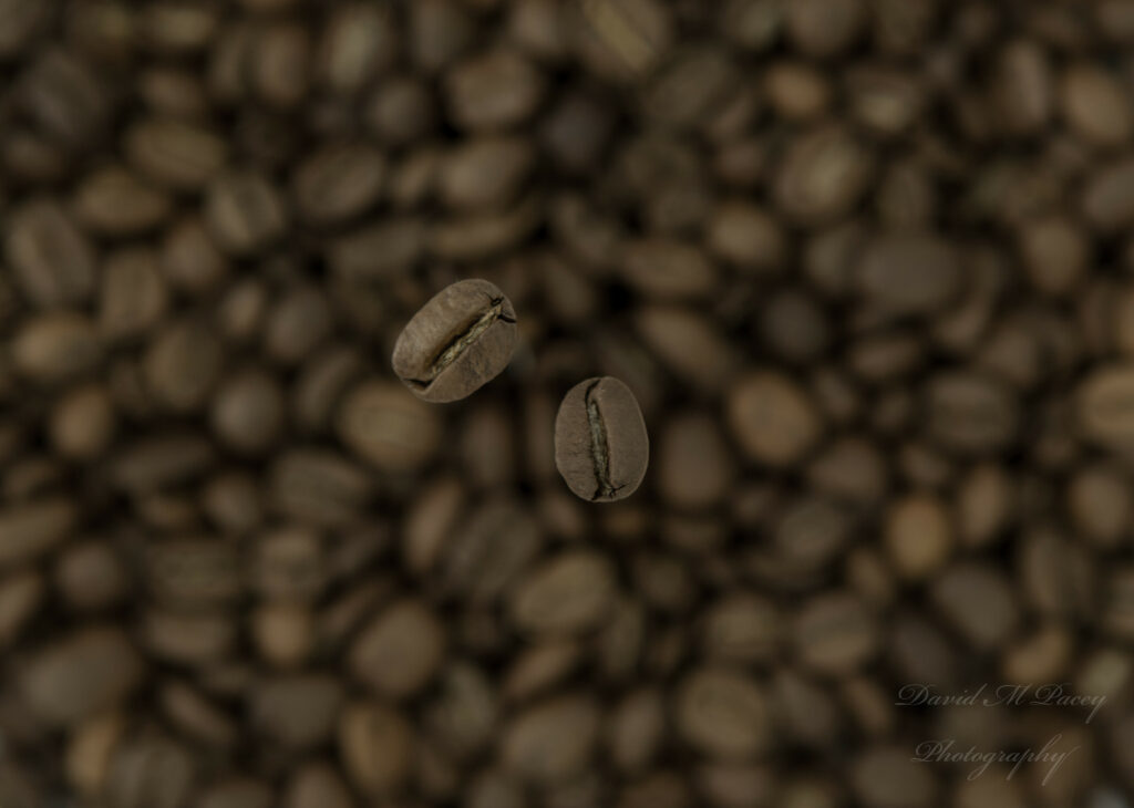 Close-Up Macro Shot of Coffee Beans - Warm Wallpaper Background