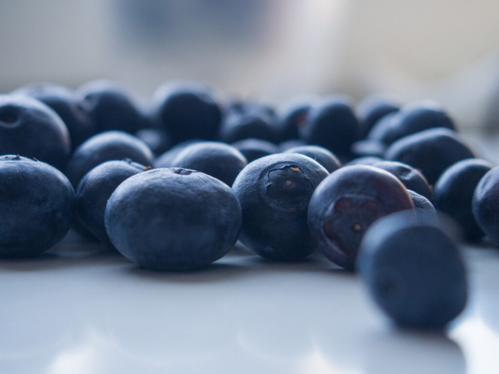 Stunning Macro Blueberries: Rich Color & Texture Wallpaper Background