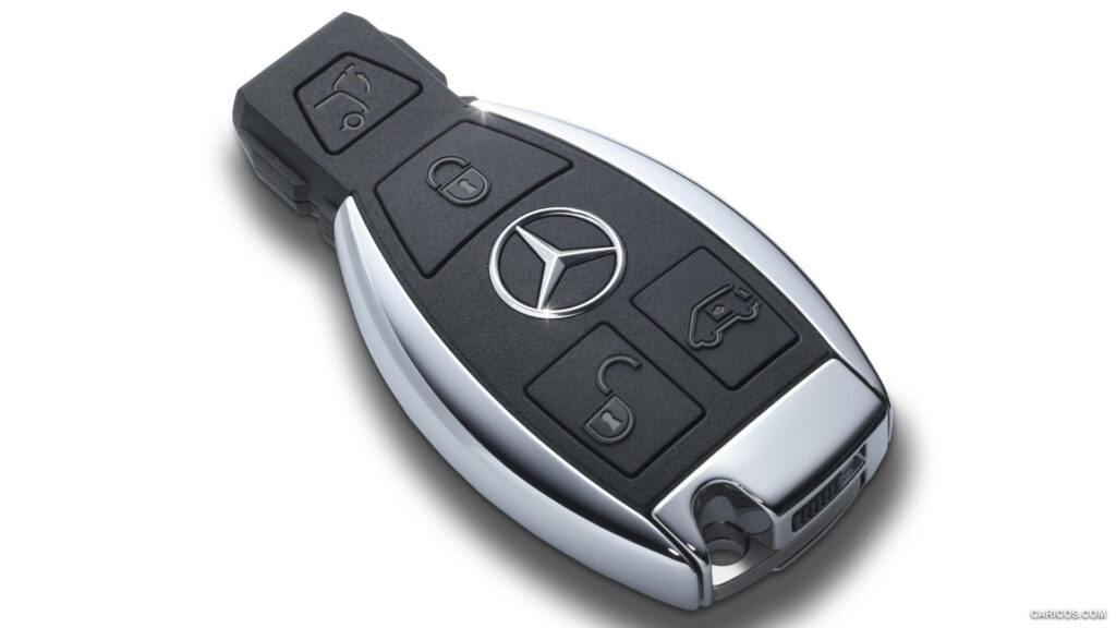 Luxury Mercedes-Benz Car Key Wallpaper: Close-Up Modern Design