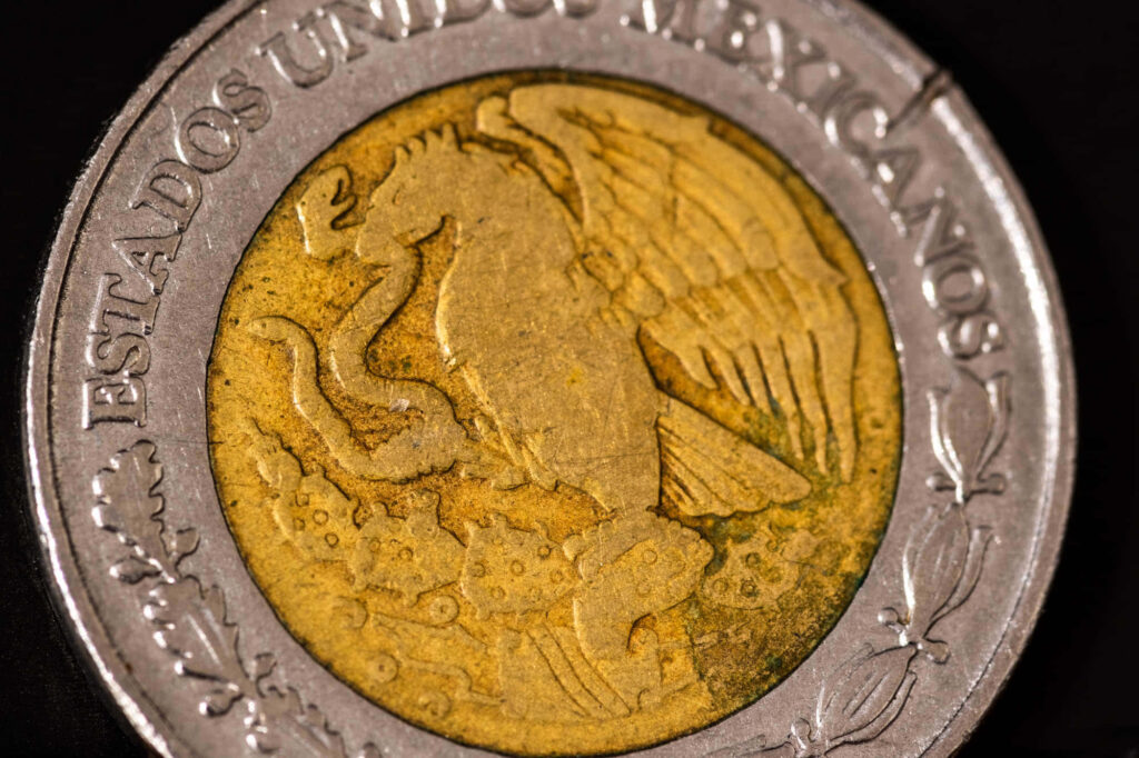 Macro Shot of Mexican Coin: Golden Eagle Design Wallpaper Background