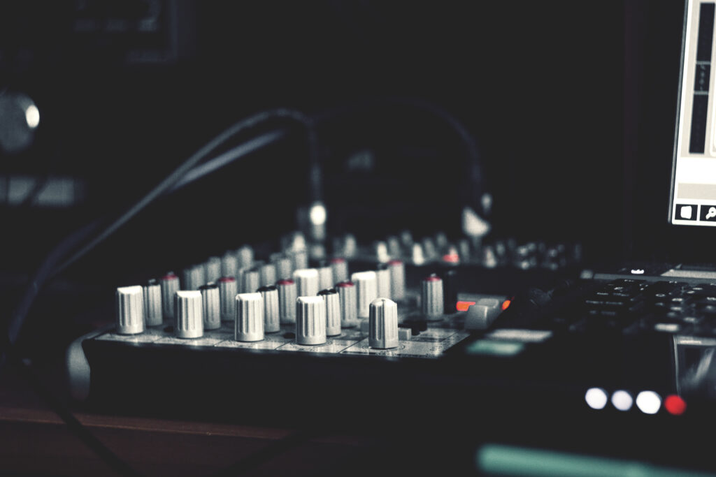 Mixing Console Wallpaper: Dim Studio Vibe & Creative Music Production