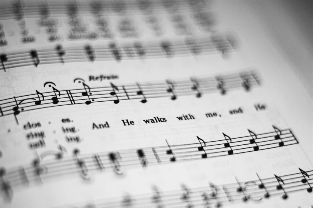 Close-Up Musical Score Wallpaper: Inspiring Sheet Music Design