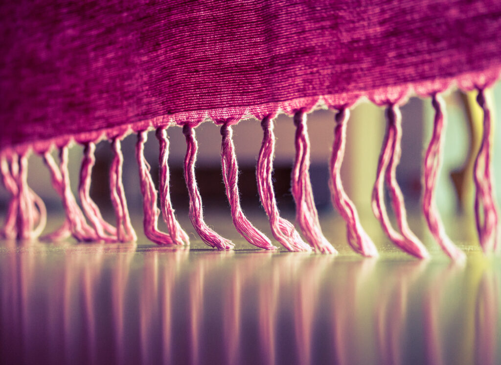 Close-Up Pink Fabric Wallpaper: Delicate Threads & Soft Texture