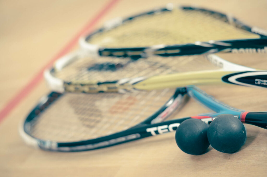 Racquetballs & Racquets: Sports Enthusiast Wallpaper Background