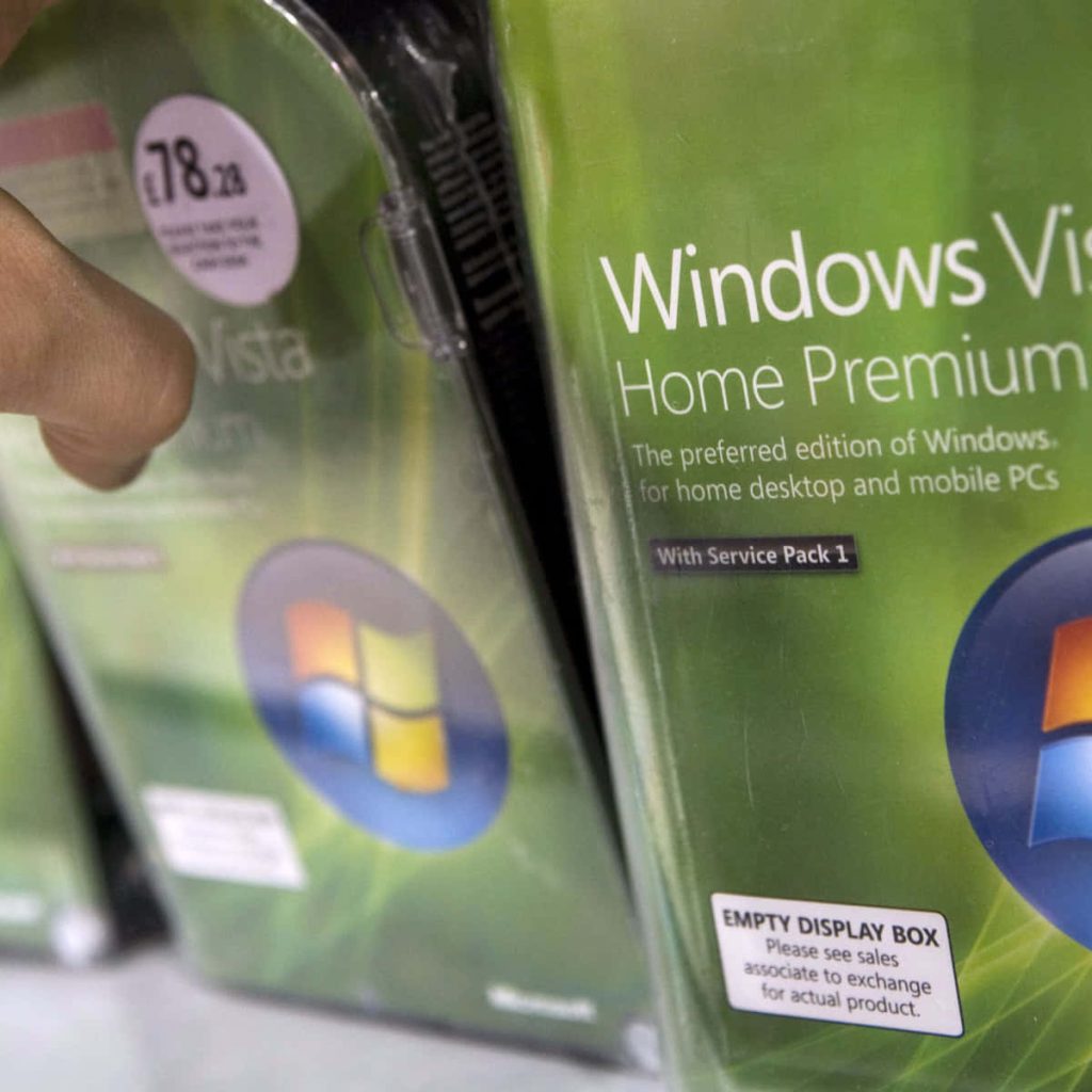 Close-up of retro Windows Vista Home Premium retail boxes with classic logo and service pack label Wallpaper