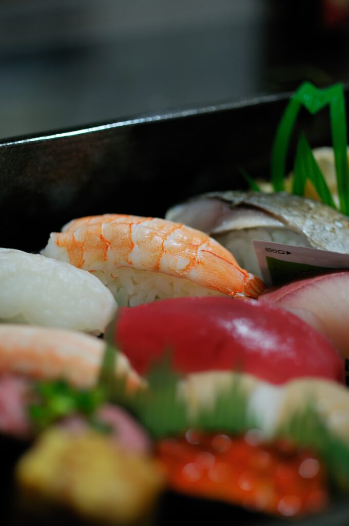 Vibrant Close-Up Sushi Wallpaper: Fresh Seafood & Traditional Ingredients