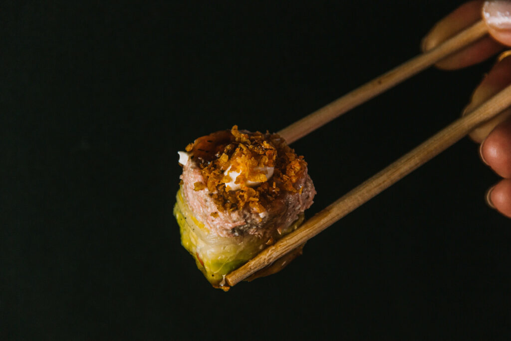 Sushi Close-Up with Crispy Topping - Minimalistic Wallpaper Background