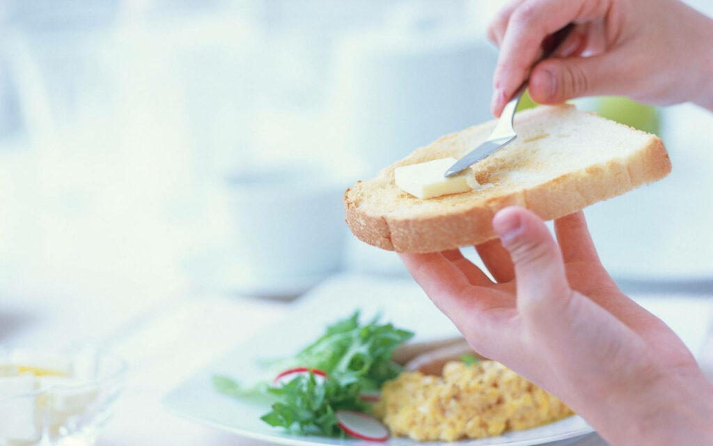 Close-Up Toasted Bread & Butter Wallpaper with Breakfast Plate