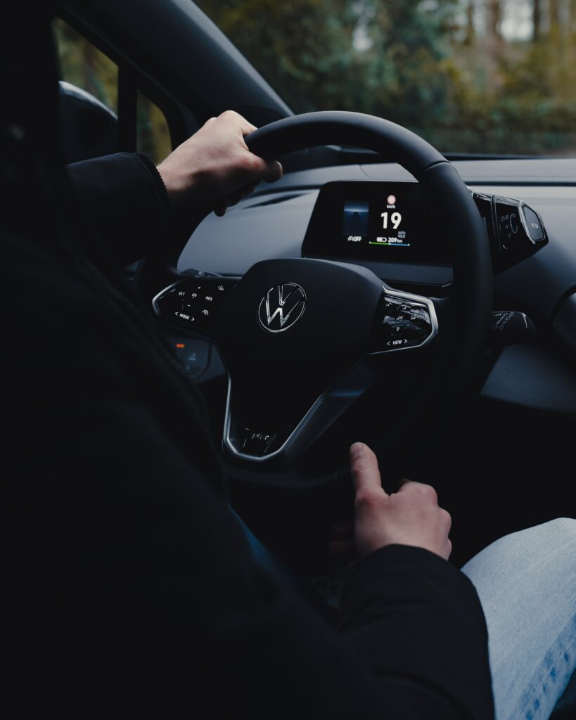 Close-Up of Volkswagen Steering Wheel – Modern Interior Design Wallpaper