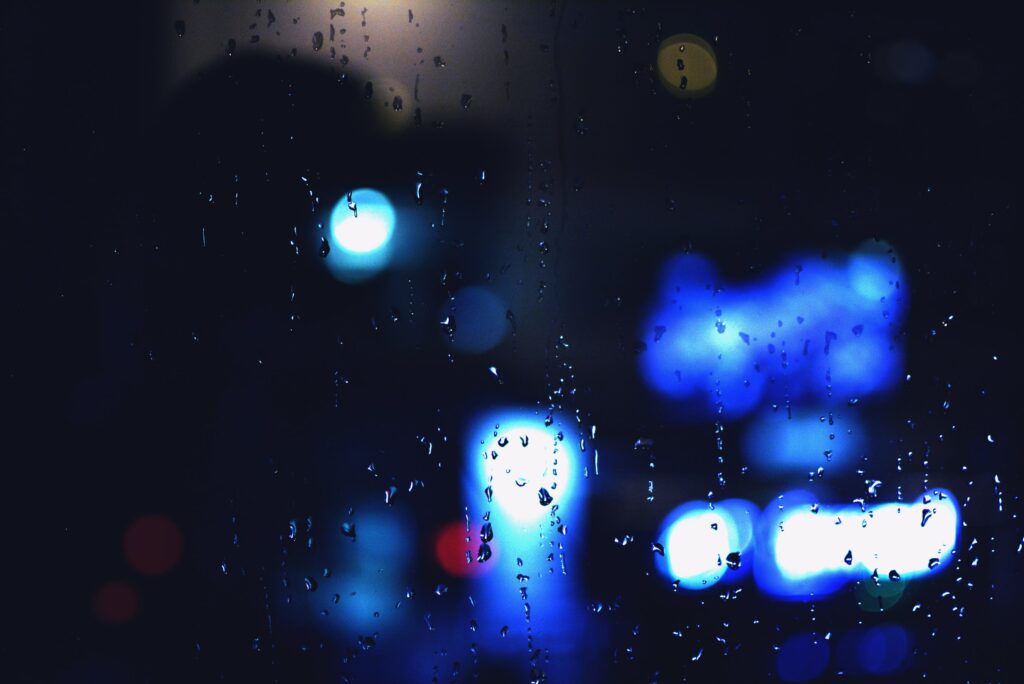 Close-Up Wet Glass Surface with Water Drops & Bokeh - Blue Wallpaper