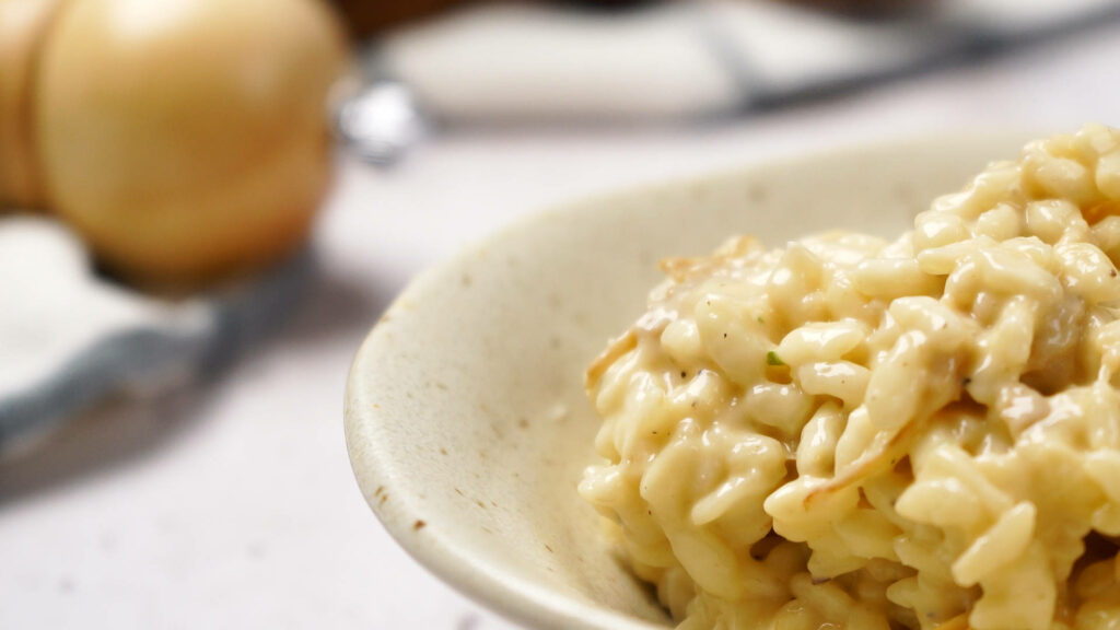 Creamy Gourmet Mushroom Risotto Close-Up - Appetizing Wallpaper