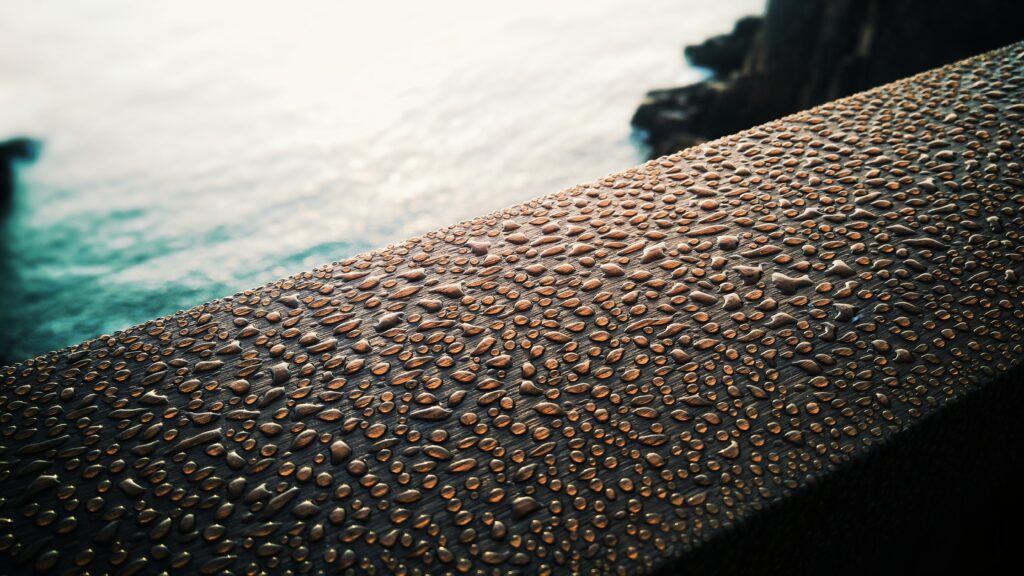 Textured Water Droplets Wallpaper with Light Reflection