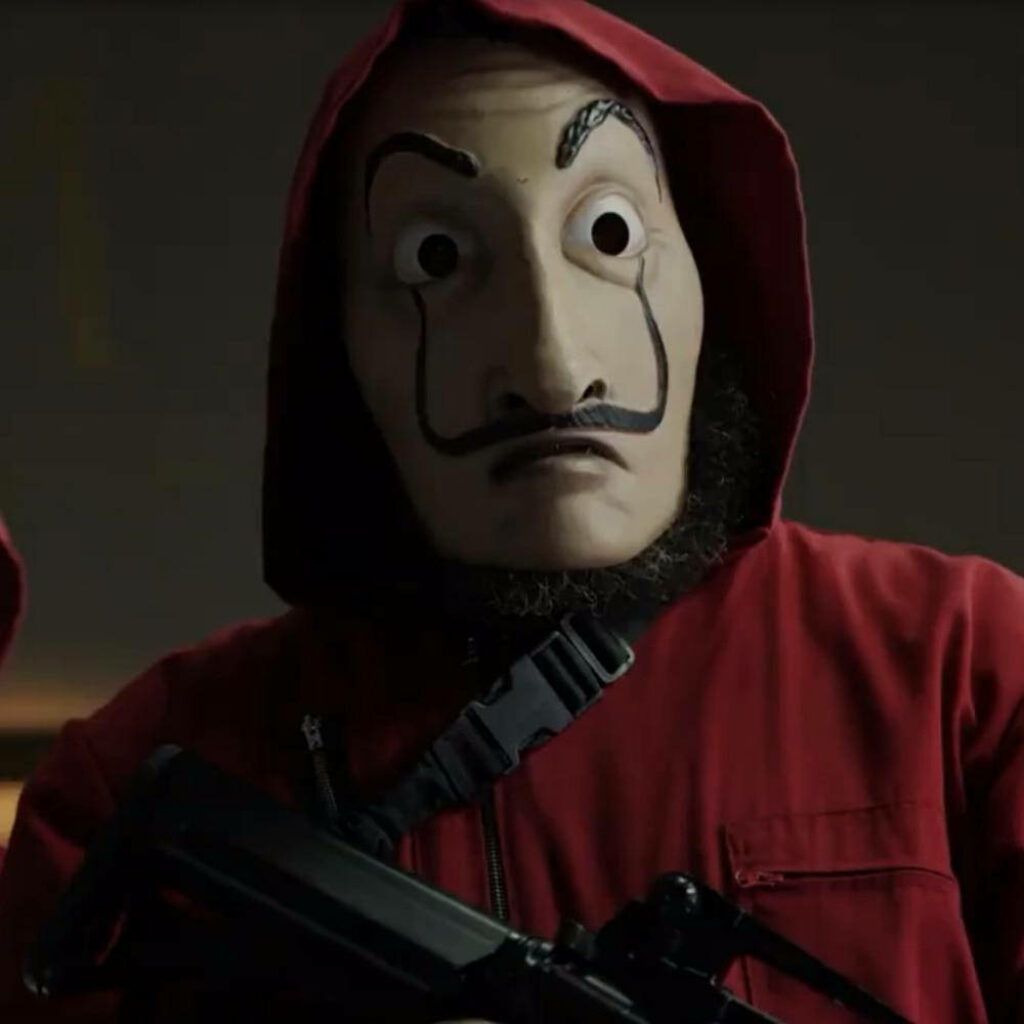 The Iconic Money Heist Mask Takes Center Stage in a Thrilling Television Series Scene Wallpaper