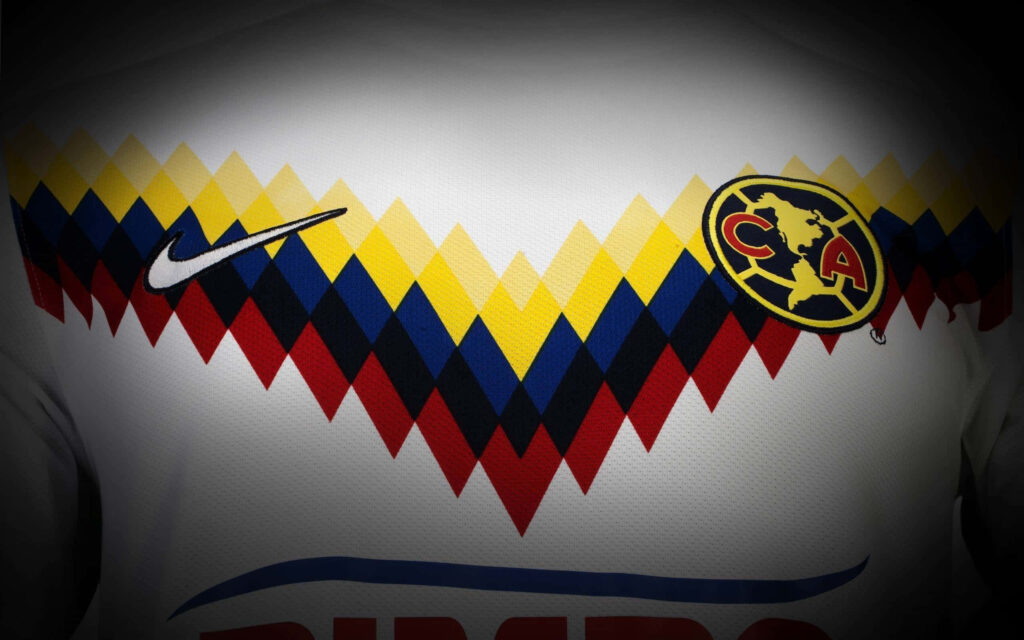 Club América jersey wallpaper with bold yellow blue red patterns official emblem and Nike logo