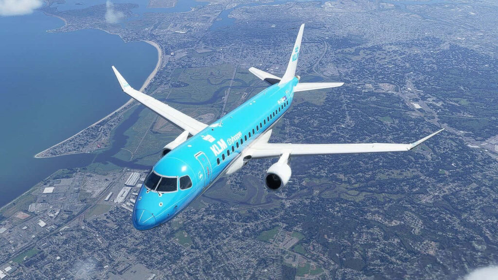 Aerial View: KLM Cityhopper Soaring Above a Coastal City in Microsoft Flight Simulator Wallpaper
