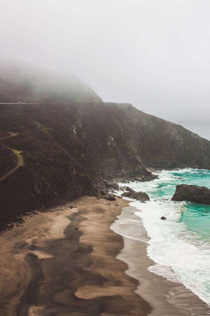 Misty Coastal Majesty: Serene Malibu Mountains Frame the Spectacular Pacific Wallpaper